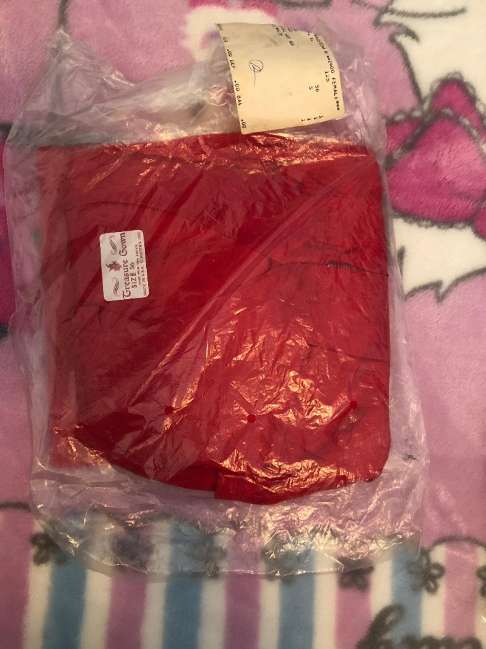 Jostens graduation cap crimson red tassel treasure gown